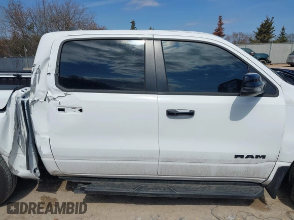 2023 Ram 1500 Laramie with VIN 1C6SRFJT8PN520610, listed as a IAAI auction lot 41898526 with 23,605 mi miles and . Bid and sale history available at DreamBid. Image 13.