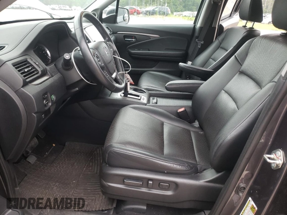 2017 Honda Ridgeline RTL-T with VIN 5FPYK3F65HB027242, listed as a Copart auction lot 62584355 with 43,165 mi miles and Salvage title. Bid and sale history available at DreamBid. Image 7.