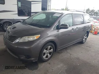 2015 Toyota Sienna LE AAS with VIN 5TDKK3DC8FS585957, listed as a IAAI auction lot 41888825 with 157,364 mi miles and . Bid and sale history available at DreamBid. Image 18.