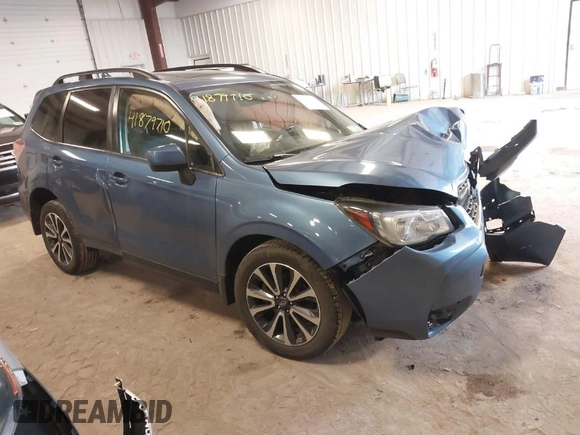 2018 Subaru Forester Premium with VIN JF2SJGECXJH606668, listed as a IAAI auction lot 41879710 with 64,910 mi miles. Bid and sale history available at carsss.com. Image 1.
