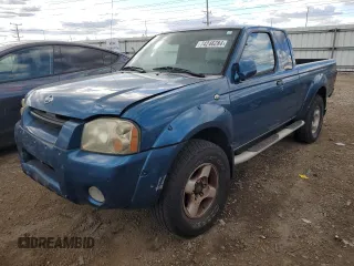 2001 Nissan Frontier SE Desert Runner with VIN 1N6ED26T01C393938, listed as a Copart auction lot 74246284 with Not provided miles and Salvage title. Bid and sale history available at DreamBid. Image 1.