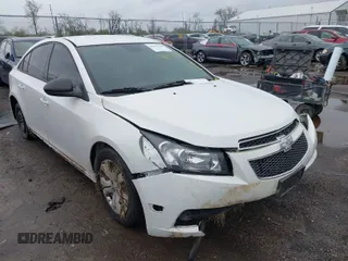 2014 Chevrolet Cruze LS with VIN 1G1PA5SH0E7145168, listed as a IAAI auction lot 41957410 with 151,422 mi miles and . Bid and sale history available at DreamBid. Image 1.