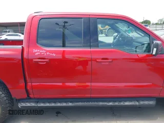2023 Ford F-150 Lightning Pro with VIN 1FTVW1EL8PWG33656, listed as a IAAI auction lot 42260659 with 22,490 mi miles and . Bid and sale history available at DreamBid. Image 13.