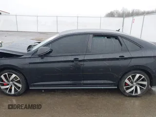 2021 Volkswagen Jetta GLI S with VIN 3VW6T7BU1MM021661, listed as a IAAI auction lot 41563793 with 124,250 mi miles and . Bid and sale history available at DreamBid. Image 14.