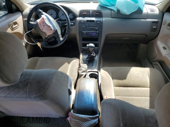 1998 Nissan Maxima GXE с VIN JN1CA21D7WM901362, выставлен на аукционе Copart как лот 58243765 с пробегом Не указан миль и Списание • Salvage title. История ставок и продаж доступна на DreamBid. Изображение 8.