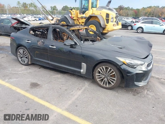 2018 Kia Stinger Premium with VIN KNAE25LA1J6011067, listed as a IAAI auction lot 40893308 with 20 mi miles. Bid and sale history available at carsss.com. Image 1.
