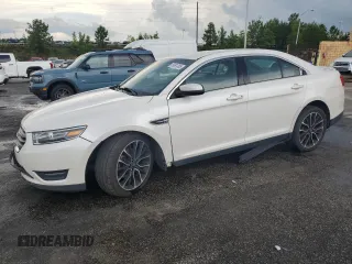 2018 Ford Taurus SEL with VIN 1FAHP2H89JG113481, listed as a Copart auction lot 59991365 with 192,971 mi miles and Salvage title. Bid and sale history available at DreamBid. Image 1.
