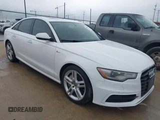 2014 Audi A6 Prestige with VIN WAUHGAFC6EN154497, listed as a IAAI auction lot 42189308 with 97,472 mi miles and . Bid and sale history available at DreamBid. Image 1.