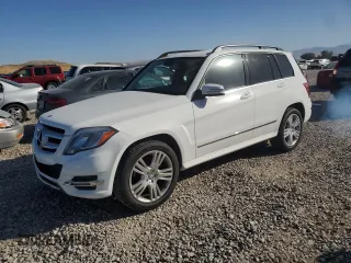 2014 Mercedes-Benz GLK 250 with VIN WDCGG0EB7EG288855, listed as a Copart auction lot 71674894 with 64,317 mi miles and Salvage Title. Bid and sale history available at DreamBid. Image 1.