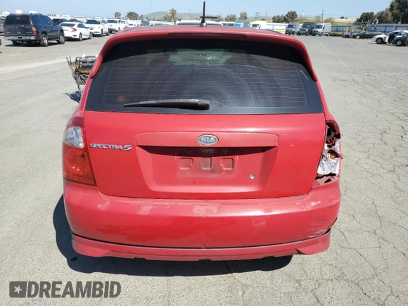 2005 Kia Spectra with VIN KNAFE162455069422, listed as a Copart auction lot 52999455 with 249,774 mi miles and Salvage Title. Bid and sale history available at carsss.com. Image 6.