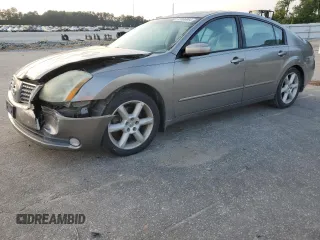 2004 Nissan Maxima SE with VIN 1N4BA41E24C878448, listed as a Copart auction lot 72596984 with 329,525 mi miles and Salvage Title. Bid and sale history available at carsss.com. Image 1.