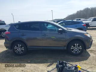 2017 Toyota RAV4 LE with VIN 2T3ZFREV9HW390859, listed as a IAAI auction lot 41802727 with 167,085 mi miles and . Bid and sale history available at carsss.com. Image 13.
