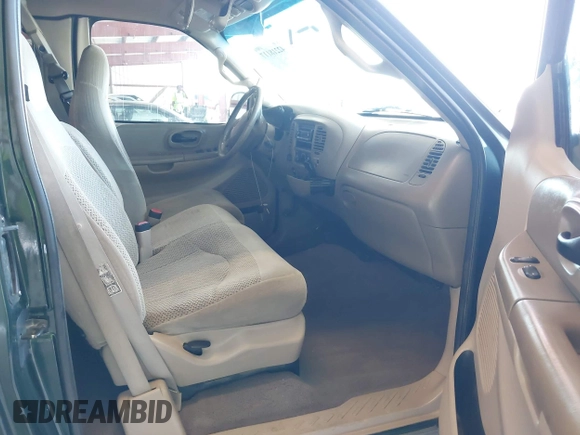 2001 Ford F-150 XL with VIN 1FTRX18W21KF20630, listed as a IAAI auction lot 42218117 with 331,592 mi miles and . Bid and sale history available at DreamBid. Image 5.
