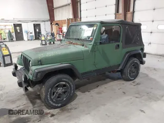 2002 Jeep Wrangler SE with VIN 1J4FA29P62P758139, listed as a IAAI auction lot 42217562 with 159,157 mi miles and . Bid and sale history available at DreamBid. Image 2.