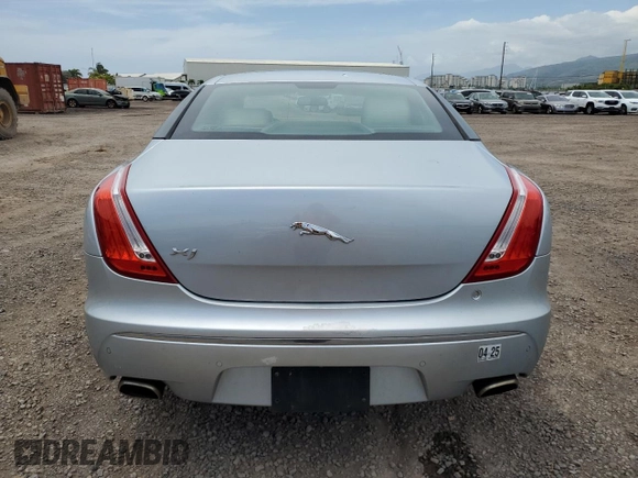2011 Jaguar XJ with VIN SAJWA1CB9BLV05595, listed as a Copart auction lot 54947855 with 39,516 mi miles and Salvage title. Bid and sale history available at DreamBid. Image 6.