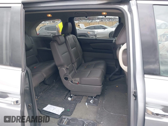 2016 Honda Odyssey Touring Elite with VIN 5FNRL5H99GB107896, listed as a IAAI auction lot 42040395 with 162,120 mi miles and . Bid and sale history available at carsss.com. Image 8.