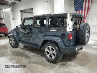 2018 Jeep Wrangler JK Unlimited Sahara with VIN 1C4HJWEG2JL835901, listed as a Copart auction lot 74591474 with 20,389 mi miles and Salvage Title. Bid and sale history available at carsss.com. Image 2.
