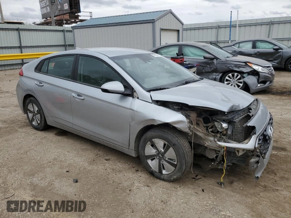 2022 Hyundai Ioniq Blue with VIN KMHC65LC0NU284899, listed as a Copart auction lot 51975395 with 96,100 mi miles and Salvage title. Bid and sale history available at DreamBid. Image 4.