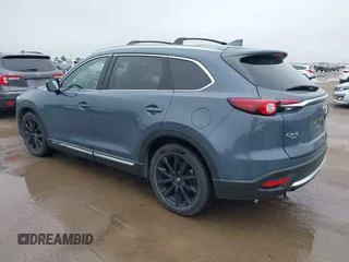 2021 Mazda CX-9 Grand Touring with VIN JM3TCBDY9M0534966, listed as a IAAI auction lot 42166071 with 77,817 mi miles and . Bid and sale history available at DreamBid. Image 3.
