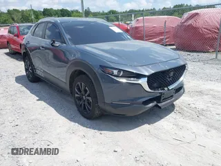 2024 Mazda CX-30 S Preferred with VIN 3MVDMBCM5RM648894, listed as a IAAI auction lot 42119860 with 23,857 mi miles and . Bid and sale history available at DreamBid. Image 1.