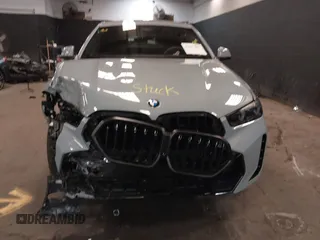 2025 BMW X6 xDrive40i with VIN 5UX33EX04S9Z44291, listed as a IAAI auction lot 41827897 with 1,053 mi miles. Bid and sale history available at carsss.com. Image 12.