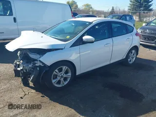 2014 Ford Focus SE with VIN 1FADP3K24EL411720, listed as a IAAI auction lot 40816752 with 102,089 mi miles. Bid and sale history available at carsss.com. Image 2.