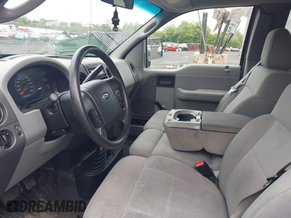 2006 Ford F-150 STX with VIN 1FTRX14W36FA48427, listed as a IAAI auction lot 42450682 with 122,743 mi miles and . Bid and sale history available at DreamBid. Image 5.