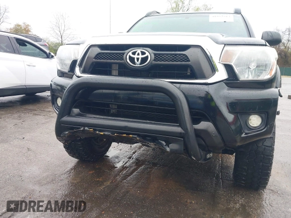 2015 Toyota Tacoma with VIN 3TMLU4ENXFM185371, listed as a IAAI auction lot 41952513 with 87,128 mi miles and . Bid and sale history available at DreamBid. Image 6.