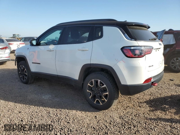 2021 Jeep Compass Trailhawk with VIN 3C4NJDDB9MT511835, listed as a Copart auction lot 63119815 with 79,360 mi miles and Salvage title. Bid and sale history available at DreamBid. Image 2.