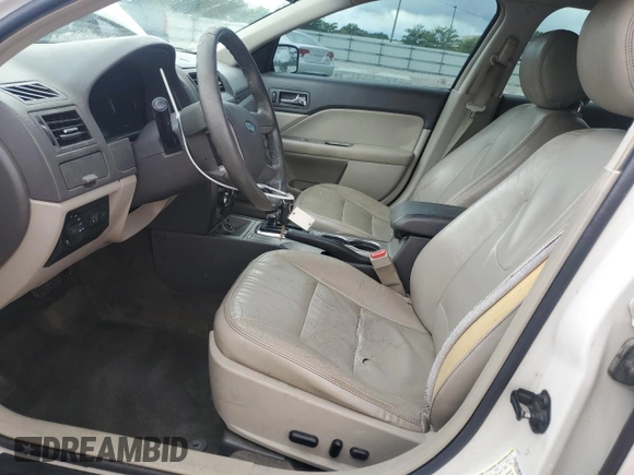 2012 Ford Fusion SEL with VIN 3FAHP0JA0CR249382, listed as a Copart auction lot 61173215 with 220,214 mi miles and Salvage title. Bid and sale history available at DreamBid. Image 7.