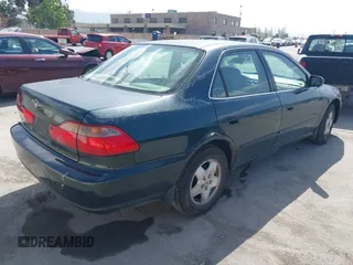 1998 Honda Accord EX z VIN 1HGCG1654WA030513, wystawiony jako IAAI lot #42057213 z przebiegiem 261 897 mil mil oraz . Historia ofert i sprzedaży dostępna na DreamBid. Obrazek 4.