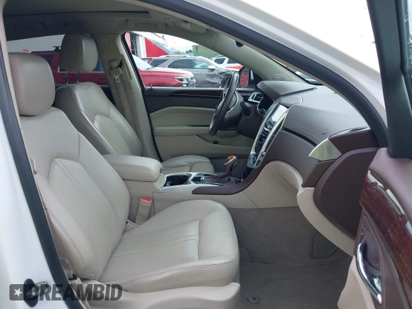 2016 Cadillac SRX Luxury Collection z VIN 3GYFNBE33GS507014, wystawiony jako IAAI lot #41979980 z przebiegiem 115 077 mil mil oraz . Historia ofert i sprzedaży dostępna na DreamBid. Obrazek 5.