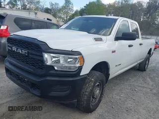 2022 Ram 2500 Tradesman with VIN 3C6UR5HJ3NG202553, listed as a IAAI auction lot 41845647 with 136,738 mi miles and . Bid and sale history available at DreamBid. Image 2.