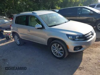 2012 Volkswagen Tiguan SE with VIN WVGBV7AX7CW580259, listed as a IAAI auction lot 42719624 with 94,710 mi miles and . Bid and sale history available at DreamBid. Image 1.