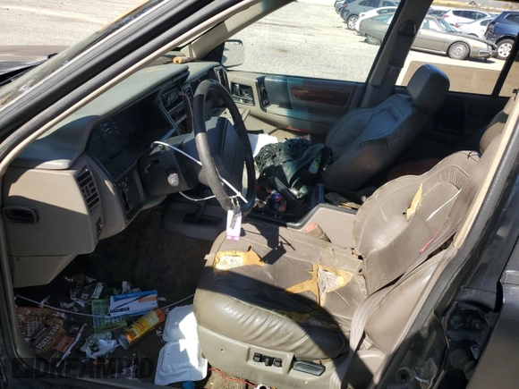 1993 Jeep Grand Cherokee Limited with VIN 1J4GZ78S3PC502345, listed as a Copart auction lot 46933805 with 121,652 mi miles and Salvage title. Bid and sale history available at DreamBid. Image 7.