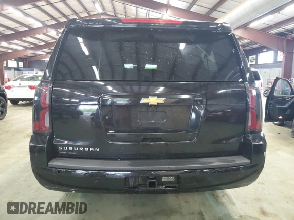2017 Chevrolet Suburban LT with VIN 1GNSKHKC4HR185340, listed as a Copart auction lot 55830355 with 196,683 mi miles and Salvage Title. Bid and sale history available at DreamBid. Image 6.