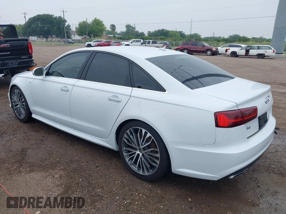 2018 Audi A6 Premium Plus z VIN WAUD8AFC7JN086796, wystawiony jako IAAI lot #42202071 z przebiegiem Nie podano mil oraz . Historia ofert i sprzedaży dostępna na DreamBid. Obrazek 3.
