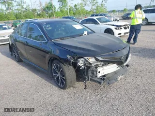 2020 Toyota Camry SE with VIN 4T1G11AK5LU504778, listed as a IAAI auction lot 42008411 with 63,391 mi miles. Bid and sale history available at carsss.com. Image 1.