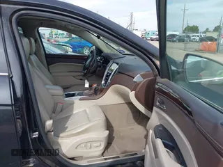 2013 Cadillac SRX Luxury Collection with VIN 3GYFNCE33DS617143, listed as a IAAI auction lot 41876084 with 102,512 mi miles. Bid and sale history available at carsss.com. Image 5.