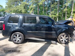 2013 Honda Pilot Touring with VIN 5FNYF3H96DB011470, listed as a IAAI auction lot 42535022 with 201,380 mi miles and . Bid and sale history available at DreamBid. Image 14.
