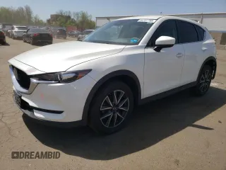 2018 Mazda CX-5 Touring with VIN JM3KFBCMXJ0389773, listed as a Copart auction lot 54737795 with 82,103 mi miles and Salvage Title. Bid and sale history available at DreamBid. Image 1.