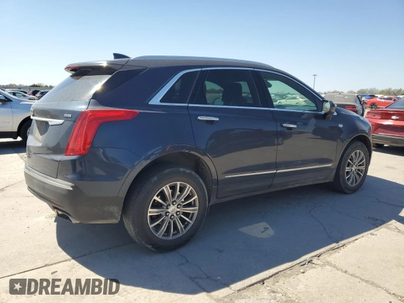 2019 Cadillac XT5 Luxury FWD with VIN 1GYKNCRS1KZ131818, listed as a Copart auction lot 49354595 with 131,995 mi miles and Salvage Title. Bid and sale history available at DreamBid. Image 3.