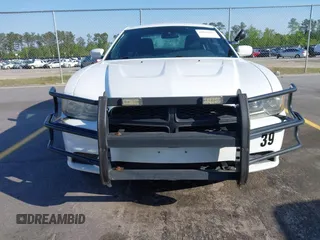2014 Dodge Charger Police with VIN 2C3CDXAT8EH348719, listed as a IAAI auction lot 42026437 with 140,573 mi miles and . Bid and sale history available at DreamBid. Image 12.