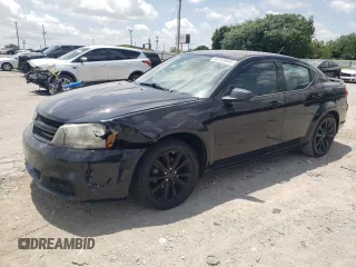 2014 Dodge Avenger SE with VIN 1C3CDZAB1EN181954, listed as a Copart auction lot 62703605 with 157,388 mi miles and Salvage title. Bid and sale history available at DreamBid. Image 1.