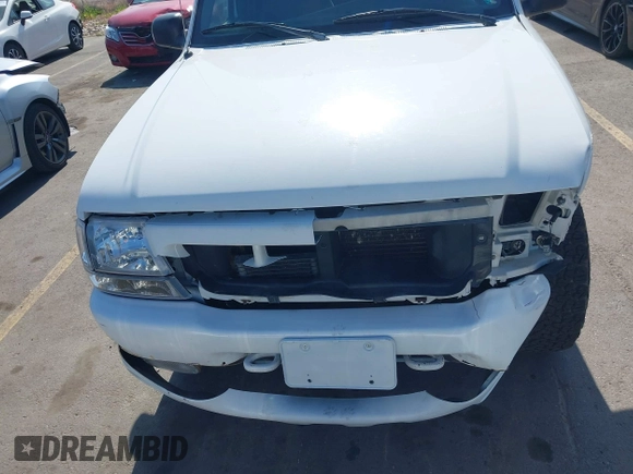 1999 Ford Ranger XLT with VIN 1FTZR15X0XPA79051, listed as a IAAI auction lot 42415443 with 246,329 mi miles and . Bid and sale history available at DreamBid. Image 13.
