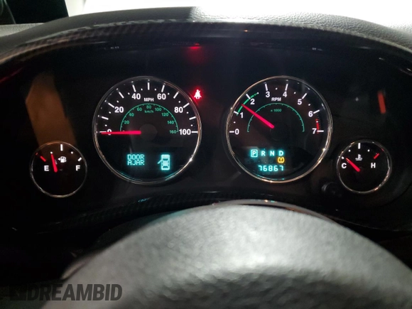 2014 Jeep Wrangler Unlimited Sport with VIN 1C4BJWDG4EL125251, listed as a Copart auction lot 51092675 with 76,867 mi miles and Clean Title. Bid and sale history available at carsss.com. Image 9.