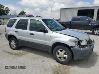 2002 Ford Escape XLT Choice with VIN 1FMYU03142KA49202, listed as a Copart auction lot 56359445 with Not provided miles and Clean title. Bid and sale history available at DreamBid. Image 4.
