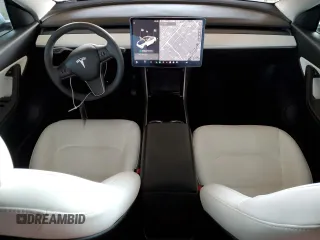 2021 Tesla Model Y Long Range with VIN 5YJYGDEE6MF075819, listed as a Copart auction lot 50903425 with 67,857 mi miles and Salvage Title. Bid and sale history available at DreamBid. Image 8.