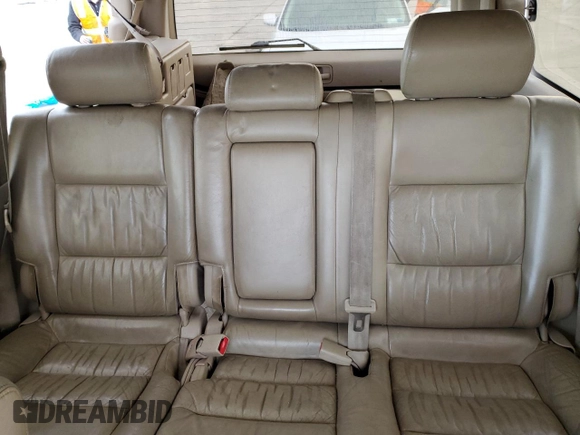 2000 Toyota Land Cruiser z VIN JT3HT05J4Y0088451, wystawiony jako Copart lot #52208905 z przebiegiem 329 751 mil mil oraz Nie do naprawy • Non repairable. Historia ofert i sprzedaży dostępna na DreamBid. Obrazek 10.