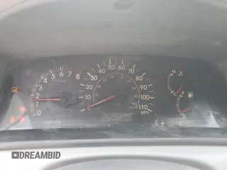 2006 Toyota Corolla CE z VIN 1NXBR32E06Z673649, wystawiony jako Copart lot #56927735 z przebiegiem 299 999 mil mil oraz Szkoda całkowita • Salvage title. Historia ofert i sprzedaży dostępna na DreamBid. Obrazek 9.